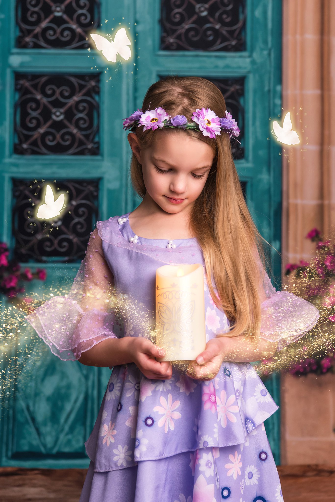 A young girl in a princess dress holds a candle while light butterflies flutter around her indoor playground waco tx